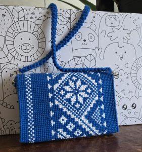 Embroidered blue purse